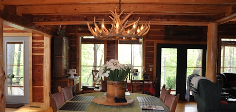 Cedar dining room of an Arkansas Ozarks log cabin