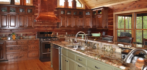 Rustic kitchen in a log cabin with all the amenities